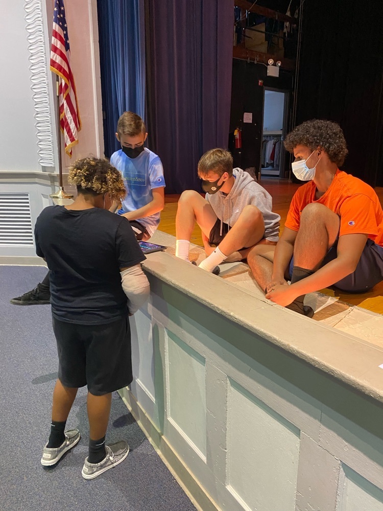 Students creating the Theme song for our news announcements. The students created the instrumental track and laid down some vocals as well.