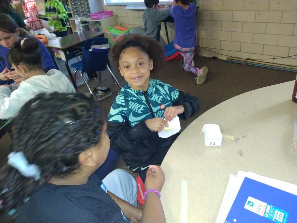The kids today learned about tornadoes and built houses with ways to help the houses survive strong winds or tornadoes. They all did really well