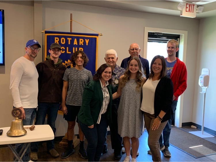 Rotary members and College Orientation students, Axl Ramirez, Arissa Waun, and Lucas Curtis