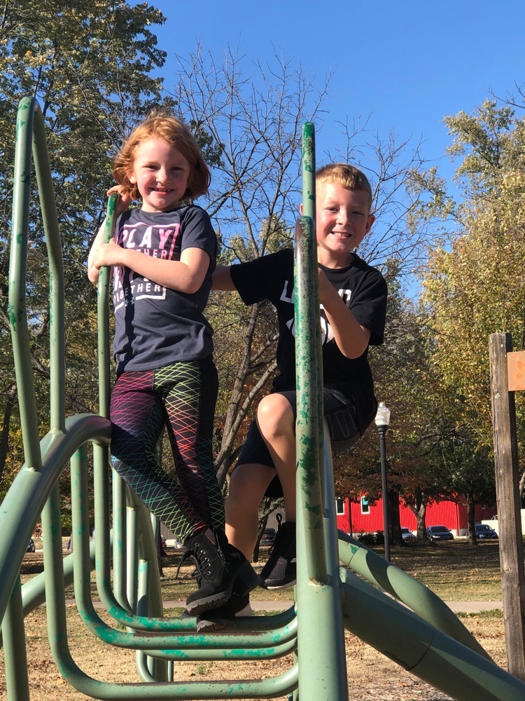 children climbing at the park