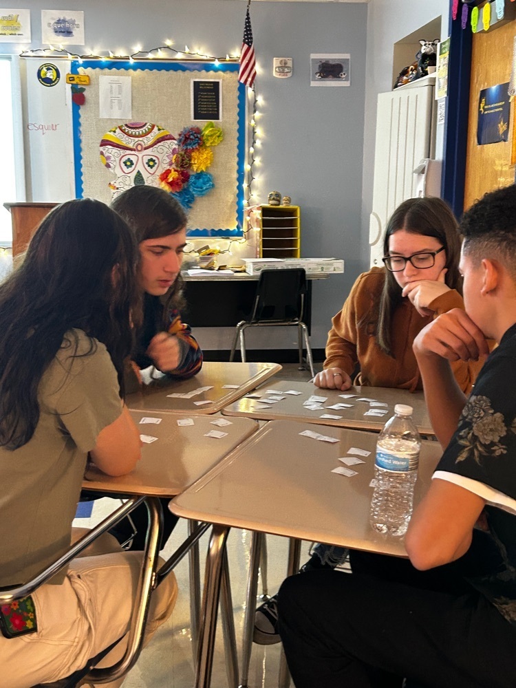 Students completing a puzzle 