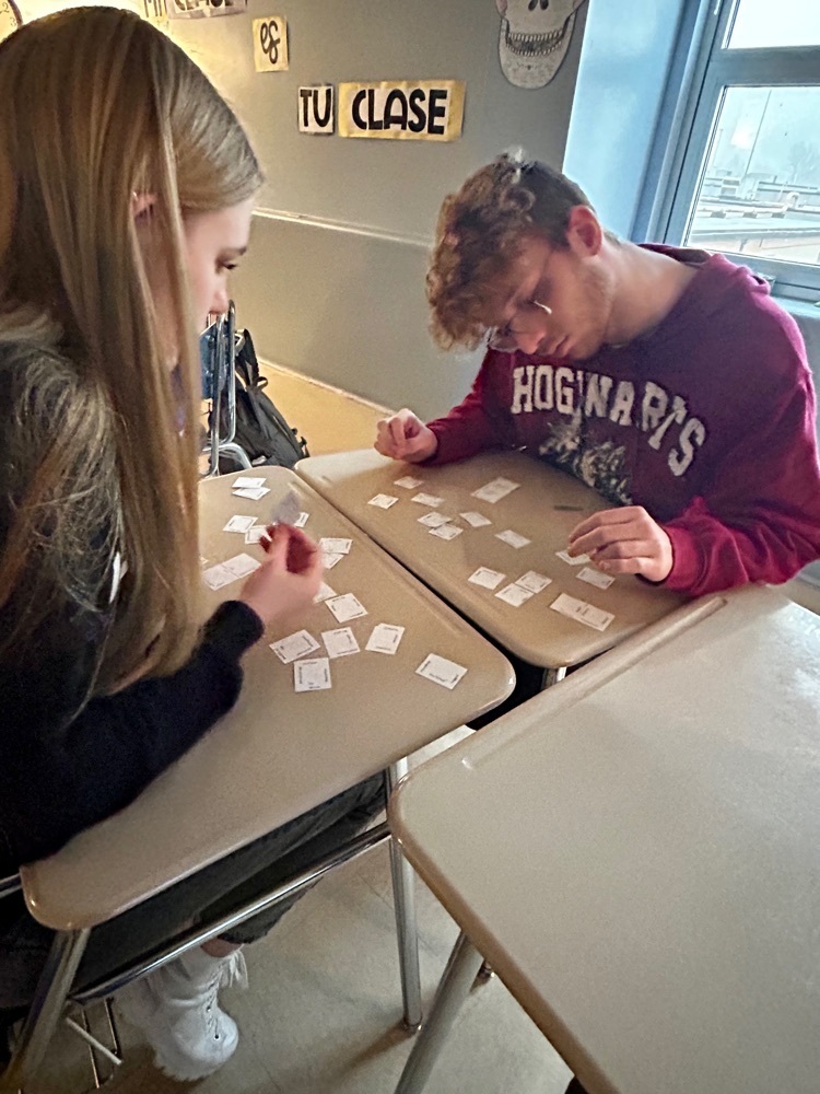 Students completing a puzzle 