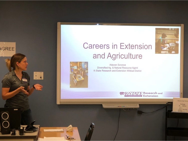 Adaven Scronce with KSU Research & Extension visiting with the College & Career Explorations class
