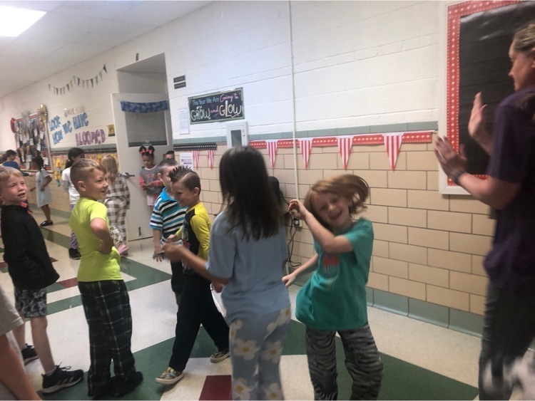 students dancing in the hallway