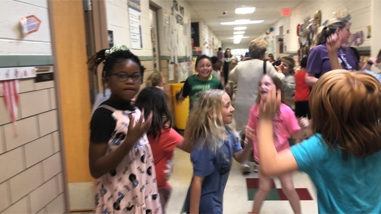 students dancing in the halls