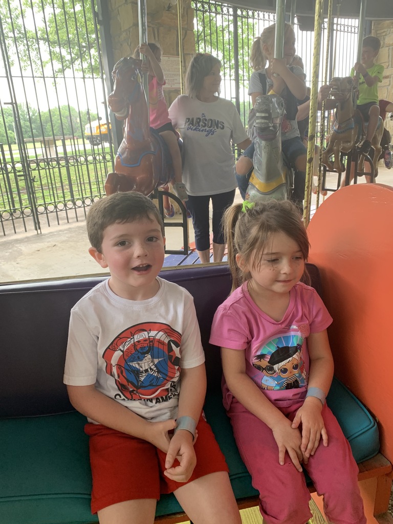 Riding the carousel Justin and Avery
