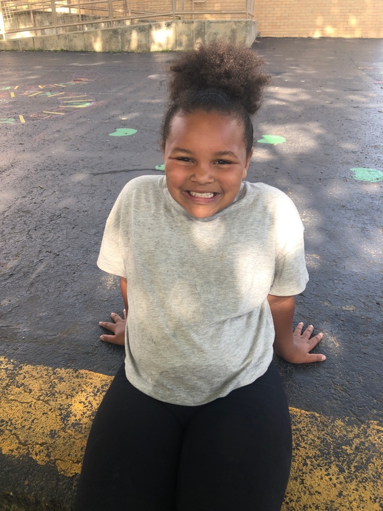 student smiling at recess