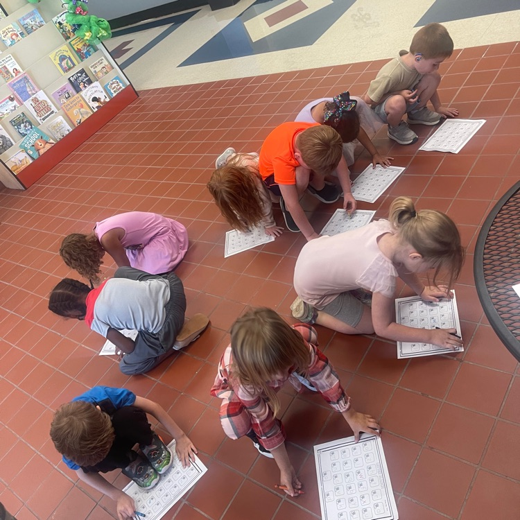 Marching through the halls on our alphabet hunt!